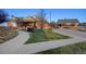 Attractive brick buildings with well-maintained landscaping and inviting walkways at 23405 E 5Th Pl # 201, Aurora, CO 80018