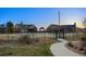 Community playground with various play structures and a landscaped walkway at 23405 E 5Th Pl # 201, Aurora, CO 80018