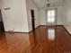 Bright living room with vaulted ceilings, laminate flooring and large picture window at 812 S Ouray St, Aurora, CO 80017