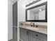 Basement bathroom with granite countertop and gray cabinets at 14059 W 5Th Ave, Golden, CO 80401