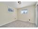 Simple bedroom with neutral walls and grey carpeting at 14059 W 5Th Ave, Golden, CO 80401