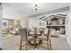 Dining area with a view into the living room and kitchen at 14059 W 5Th Ave, Golden, CO 80401