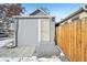 Small backyard with gravel, wooden fence, and shed at 3500 N Marion St, Denver, CO 80205