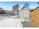 Small backyard with gravel, wooden fence, and shed at 3500 N Marion St, Denver, CO 80205