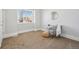 Spacious bedroom with carpet, chair, and natural light at 3500 N Marion St, Denver, CO 80205