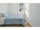 Bright bedroom featuring a single bed and ample natural light at 3500 N Marion St, Denver, CO 80205