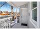 Front porch view of a house and street, winter scene at 3500 N Marion St, Denver, CO 80205