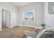 Living room with plush carpet and an inviting chair at 3500 N Marion St, Denver, CO 80205