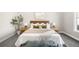 Comfortable bedroom with plush bed, stylish decor, and ample natural light at 8080 E Dartmouth Ave # 26, Denver, CO 80231