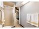 Basement bathroom with shower and linen closet at 12008 W Mexico Pl, Lakewood, CO 80228