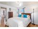 Spacious bedroom with hardwood floors and ample closet space at 12008 W Mexico Pl, Lakewood, CO 80228