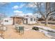 Backyard patio with firepit and small table and chairs at 12008 W Mexico Pl, Lakewood, CO 80228