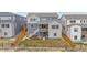 Aerial view of a backyard with a deck and patio at 174 Rockingham Cir, Castle Pines, CO 80108