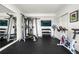 Home gym featuring workout machines and equipment, perfect for a private fitness space at 174 Rockingham Cir, Castle Pines, CO 80108