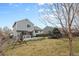 Large backyard with deck, hot tub, and trampoline, providing ample space for outdoor activities and entertainment at 5426 Bobcat St, Frederick, CO 80504