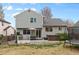 Expansive backyard with a deck, hot tub, and trampoline, perfect for outdoor relaxation and recreation at 5426 Bobcat St, Frederick, CO 80504