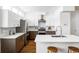 Modern kitchen with stainless steel appliances and island at 1218 Perry St, Denver, CO 80204