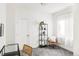 Bright home office with a stylish chair and a modern bookshelf at 1218 Perry St, Denver, CO 80204