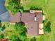 Bird's-eye view of the property's roof, surrounded by lush greenery, and featuring multiple decks at 953 Gilia Dr, Golden, CO 80401