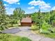 Lovely home featuring a driveway, garage, and a charming exterior nestled in a scenic setting at 953 Gilia Dr, Golden, CO 80401