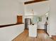 Modern kitchen featuring white cabinets, stainless steel appliances, and a bright island at 953 Gilia Dr, Golden, CO 80401