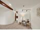 Cozy living room with neutral carpet, modern lighting, and accent chair decor at 953 Gilia Dr, Golden, CO 80401