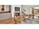 Cozy living room with fireplace and access to outdoor space at 953 Gilia Dr, Golden, CO 80401