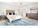 Spacious main bedroom with a walk-in closet and a luxurious ensuite bathroom at 6325 W Portland Pl, Littleton, CO 80128