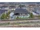 Aerial view showcases the backyard with patio and landscaping on a single Gathering home at 4213 Hickory Oaks St, Castle Rock, CO 80104