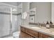 Modern bathroom with a glass enclosed shower, sleek vanity, and neutral color palette at 4213 Hickory Oaks St, Castle Rock, CO 80104