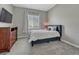 Comfortable bedroom with a new bed, large window, new carpet and dresser at 4213 Hickory Oaks St, Castle Rock, CO 80104