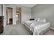 Cozy bedroom with an attached bathroom, soft carpet, and good natural lighting at 4213 Hickory Oaks St, Castle Rock, CO 80104