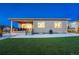 Home exterior with an outdoor entertainment area and artificial grass at 4213 Hickory Oaks St, Castle Rock, CO 80104