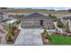 Beautiful home with a three-car garage, well-maintained lawn, and charming landscaping at 4213 Hickory Oaks St, Castle Rock, CO 80104