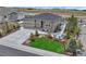 Beautiful single-Gathering home with stone accents, manicured lawn, and an outdoor living space at 4213 Hickory Oaks St, Castle Rock, CO 80104