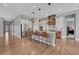 Spacious kitchen with a center island, stainless steel appliances, and hardwood floors at 4213 Hickory Oaks St, Castle Rock, CO 80104