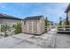 Outdoor storage shed on a concrete slab with a fenced-in area, perfect for storing tools and equipment at 4213 Hickory Oaks St, Castle Rock, CO 80104
