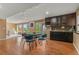Spacious game room with a poker table and kitchenette is perfect for entertaining at 6614 W Gould Dr, Littleton, CO 80123