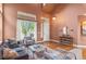 Inviting dining room with a dining table and chairs, modern light fixture, and neutral-colored walls at 6614 W Gould Dr, Littleton, CO 80123