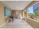 Charming playroom filled with games, toys, and natural light from the large window at 6614 W Gould Dr, Littleton, CO 80123