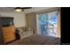 Bedroom featuring a sliding glass door providing views of the snowy scenery at 12191 Tecumseh Trl, Conifer, CO 80433