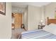 Comfortable bedroom with carpet features a closet for storage, next to the sleeping space at 12191 Tecumseh Trl, Conifer, CO 80433