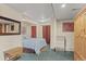 The main bedroom has carpet and curtains separating the room at 12191 Tecumseh Trl, Conifer, CO 80433
