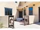 Inviting entrance featuring custom gates and a view of the front door at 5668 Red Fern Ct, Littleton, CO 80125