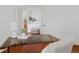 Bright office space with natural light, french doors, and a glass-topped desk at 86 Woodland Cir, Highlands Ranch, CO 80126