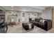 Finished basement includes a sofa, lounge chair, pool table, and door at 13200 E 160Th Ave, Brighton, CO 80602