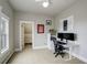 Bedroom featuring a ceiling fan, walk-in closet, desk, and large window providing natural light at 13200 E 160Th Ave, Brighton, CO 80602