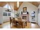 Dining room features a wood beam ceiling, a fireplace, and ample natural light at 13200 E 160Th Ave, Brighton, CO 80602