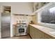 Well-equipped kitchen with stainless steel appliances, custom cabinetry, and butcher block countertops at 13200 E 160Th Ave, Brighton, CO 80602