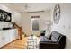 Cozy living room with hardwood floors and a comfortable seating area at 13200 E 160Th Ave, Brighton, CO 80602